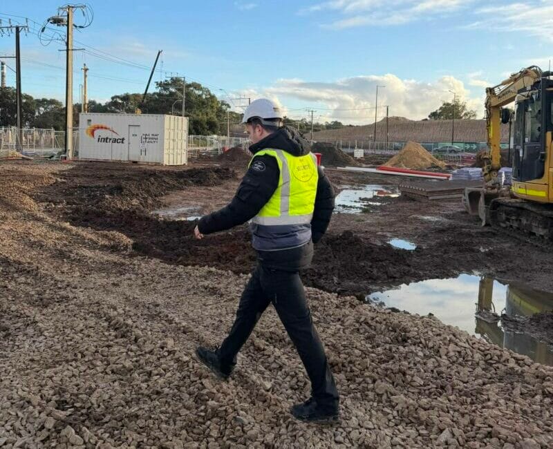 Construction site security guard patrolling the South Road T2D Project in Adelaide, protecting SA Power infrastructure and underground cables from theft, trespassing and vandalism.